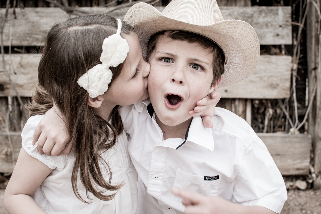 Sister kissing Brother